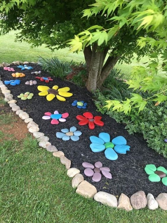 Vibrant Painted Pebble Flower Pathway