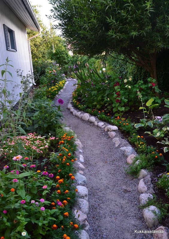 Whimsical Floral Stone-Lined Pathway