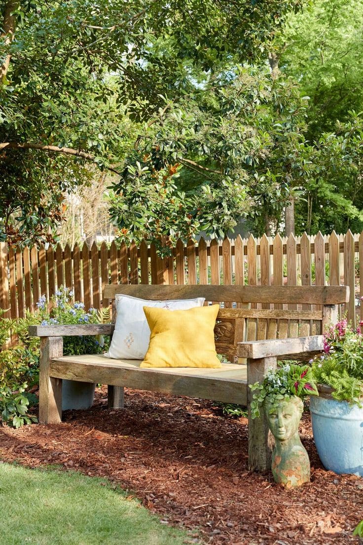 Bench and Fence Landscaping with Creative Planters