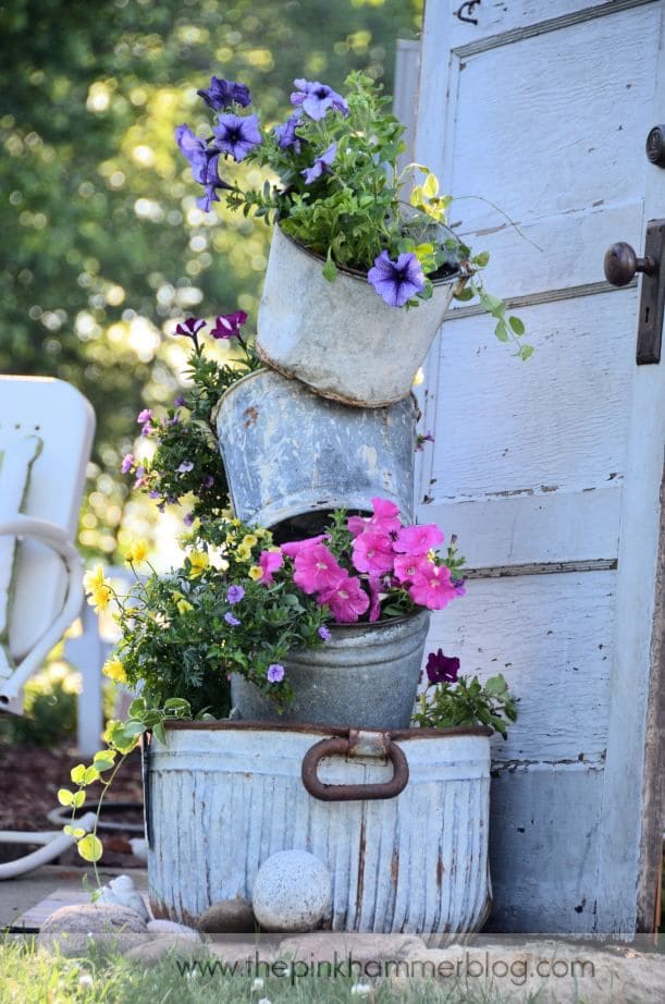 Charming Stacked Bucket Planters Display