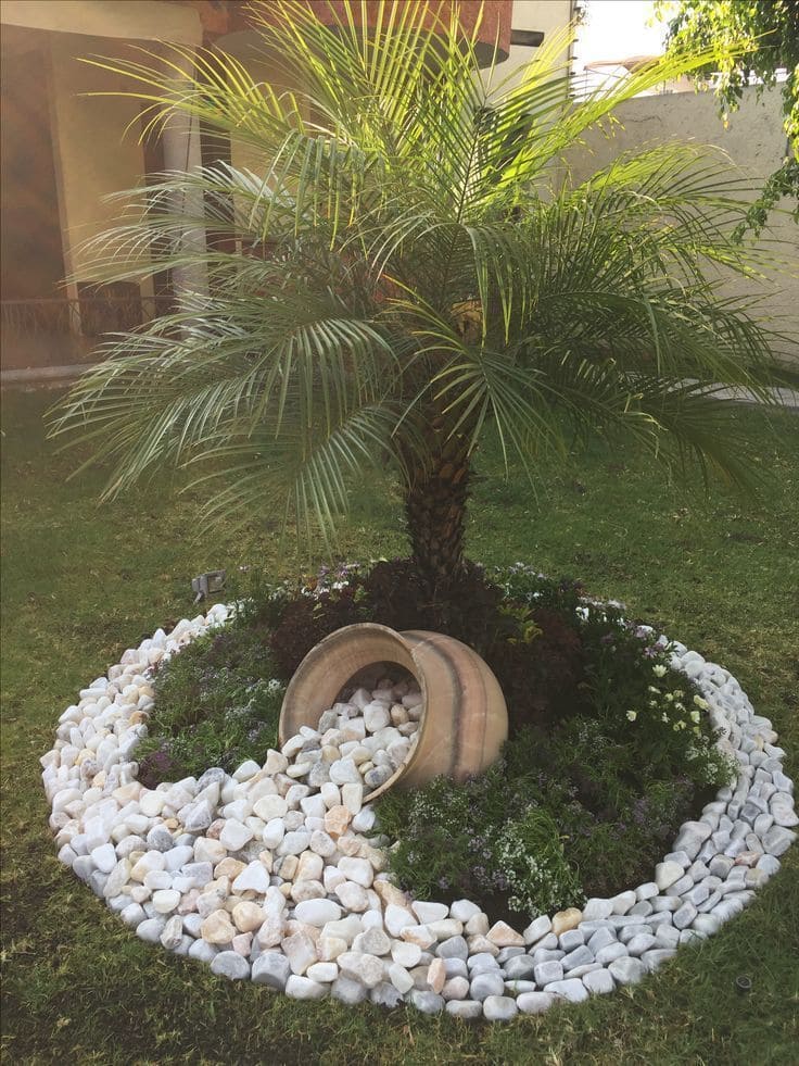 Elegant Pebble and Pot Tree Design