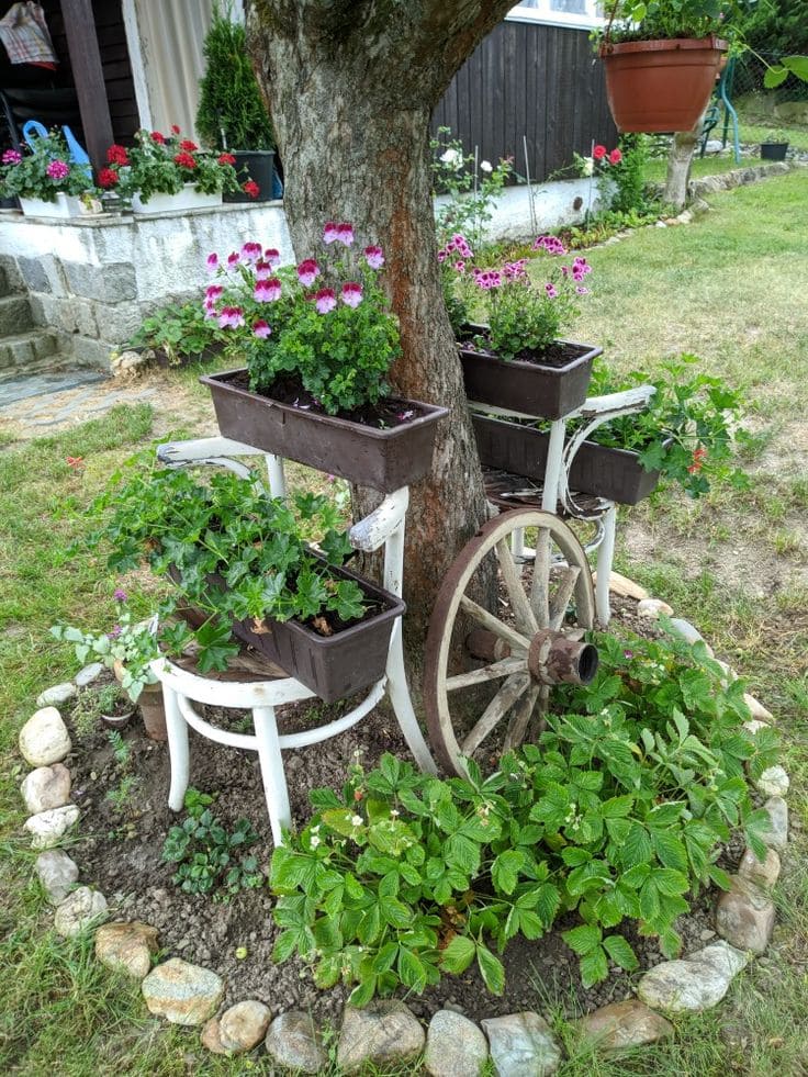 Rustic Wheel and Planter Tree Design