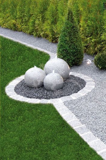 Sleek Stone Spheres in Gravel Bed