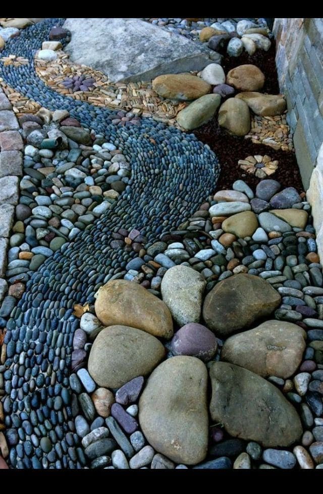 Beautiful River Rock Pathway with Flower Design