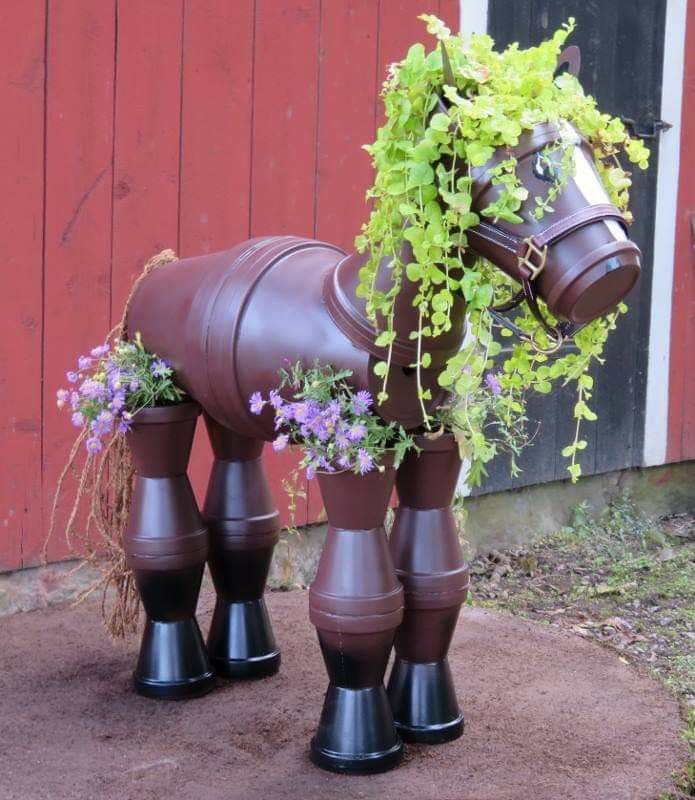 Charming Horse Planter Made From Barrels