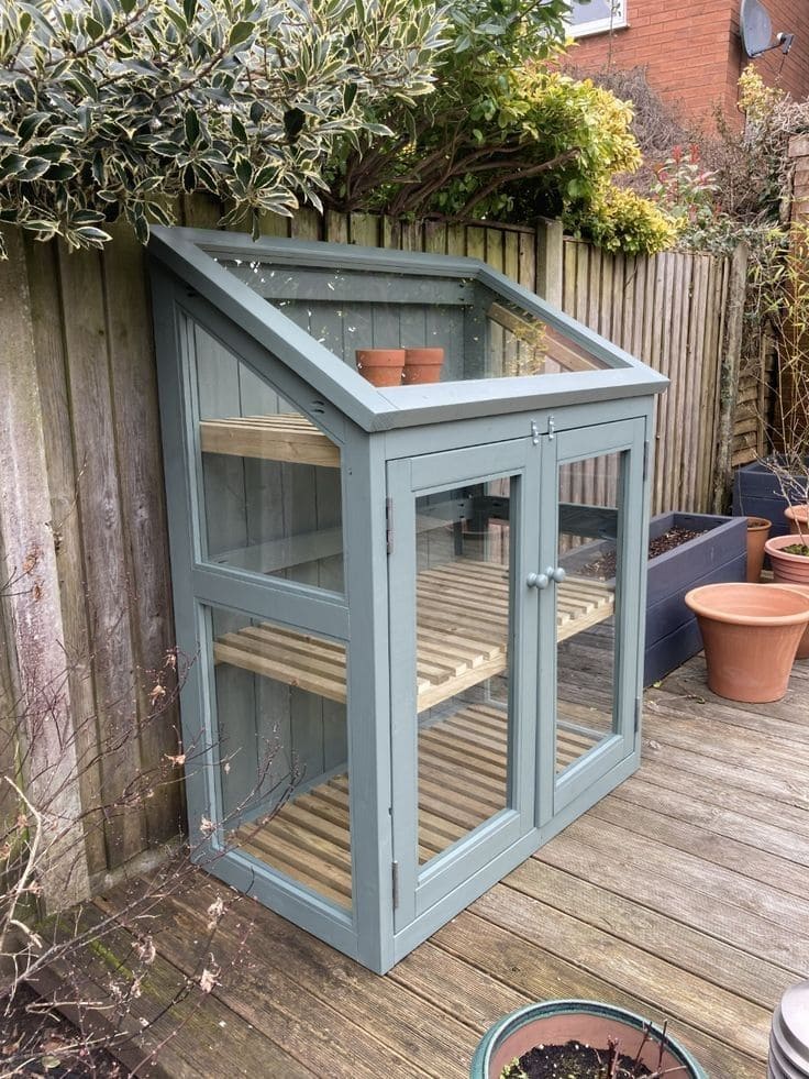 Compact Wooden Greenhouse for Small Spaces