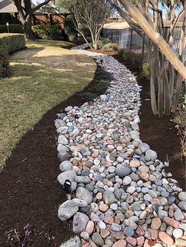 Curved River Rock Pathway Design