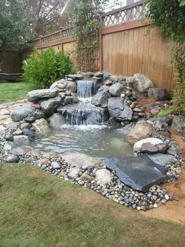 Elegant Backyard Waterfall with Natural Stones