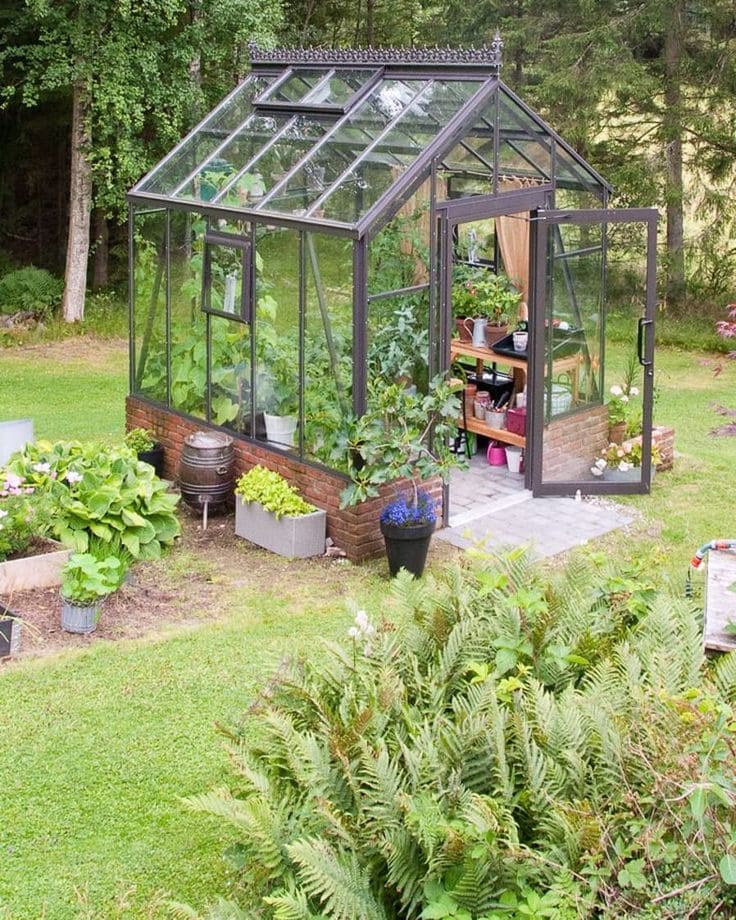 Elegant Garden Greenhouse with Decorative Details