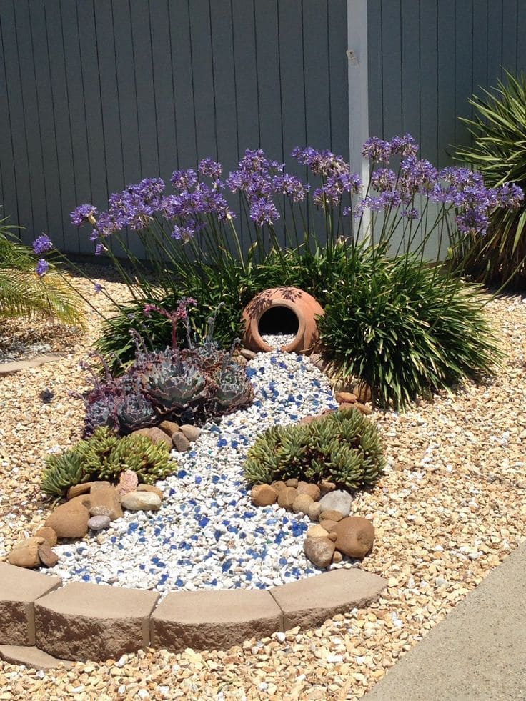 Flowing Pebble Stream with Floral Touch