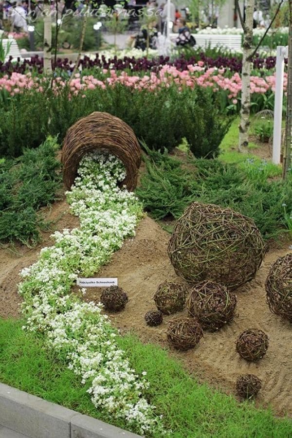 Graceful Woven Basket of Blooming White Flowers