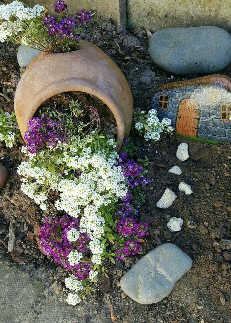 Spilled Flower Pot with Vibrant Blossoms