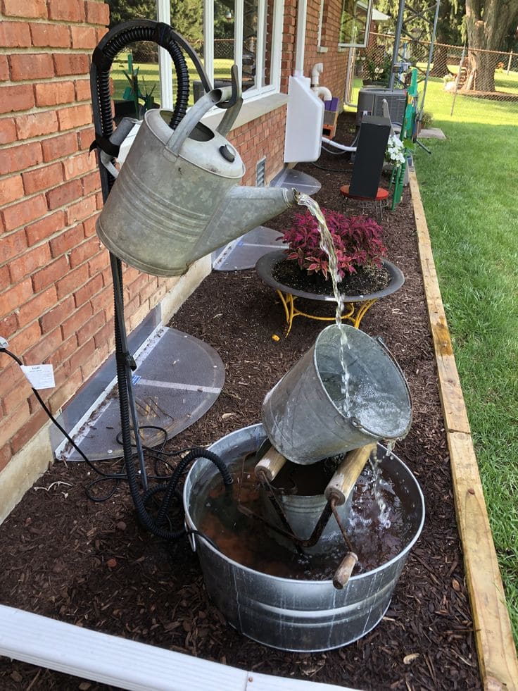 Watering Can Waterfall for Garden Spaces