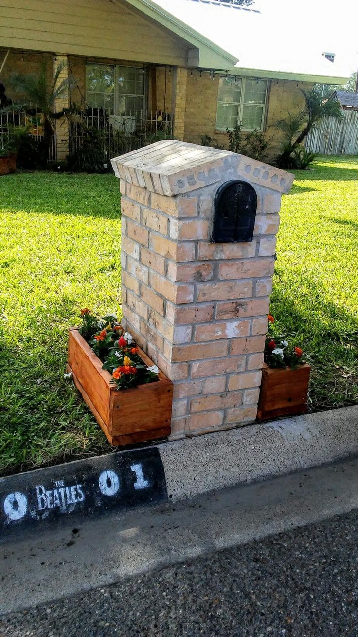 Charming Brick Mailbox with Flower Boxes Design