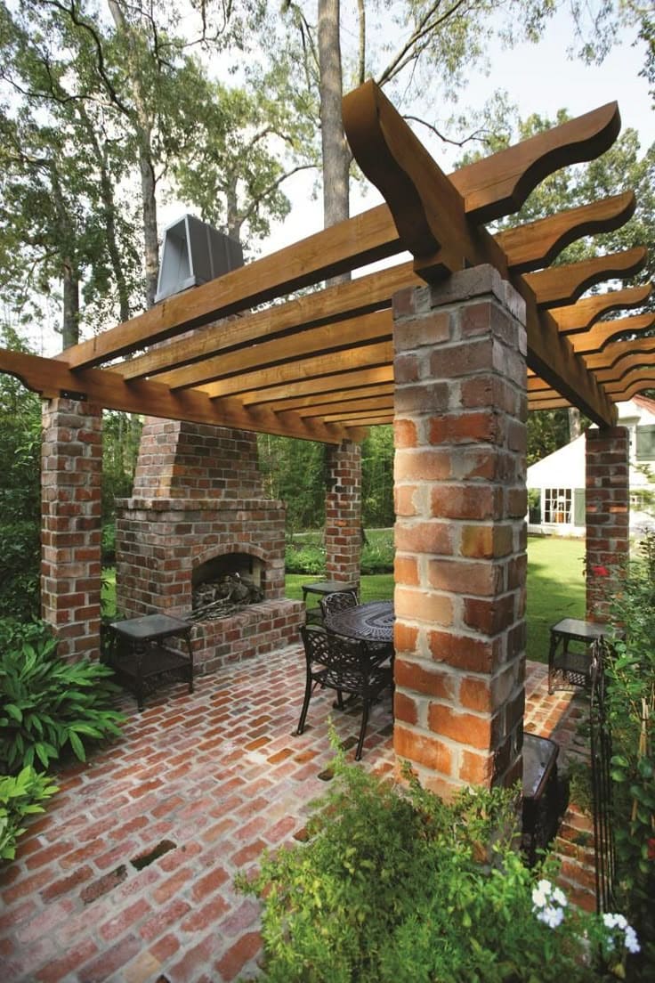 Charming Brick Outdoor Fireplace with Wooden Pergola Design