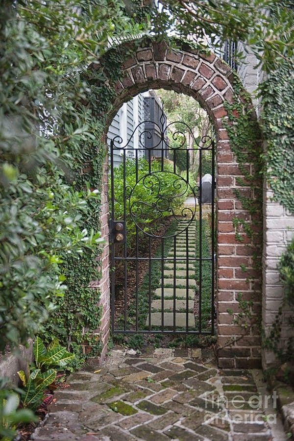 Enchanting Brick Archway with Garden Path