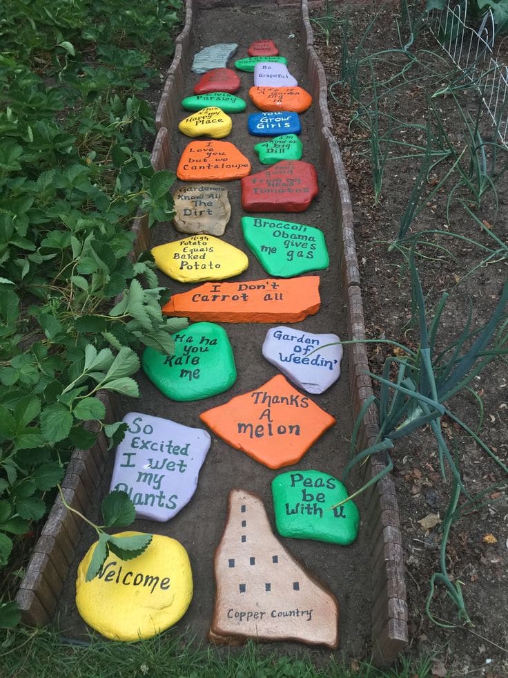 Playful Painted Rock Pathway with Garden Puns